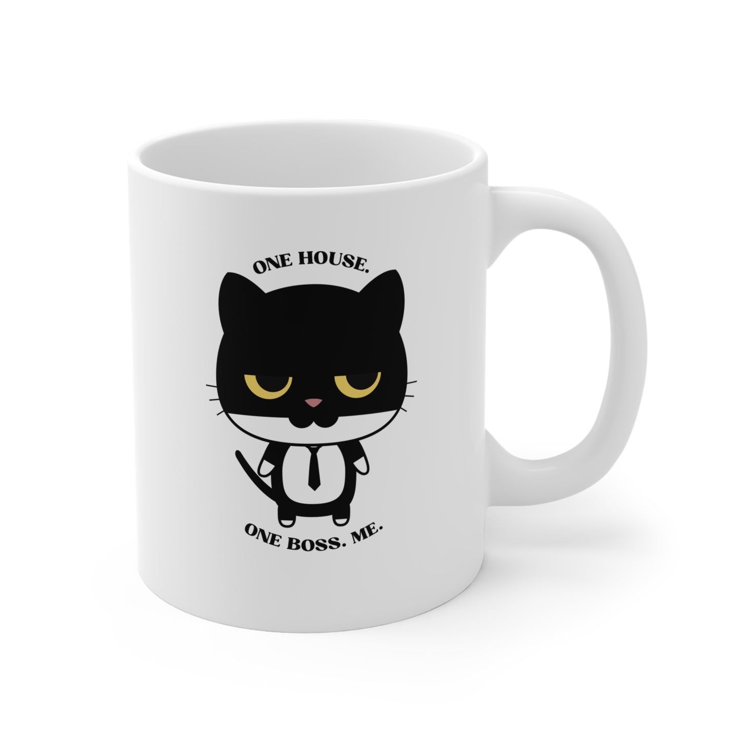 Right coffee mug with black cat graphic wearing a tie and one house one boss me slogan shown from right side