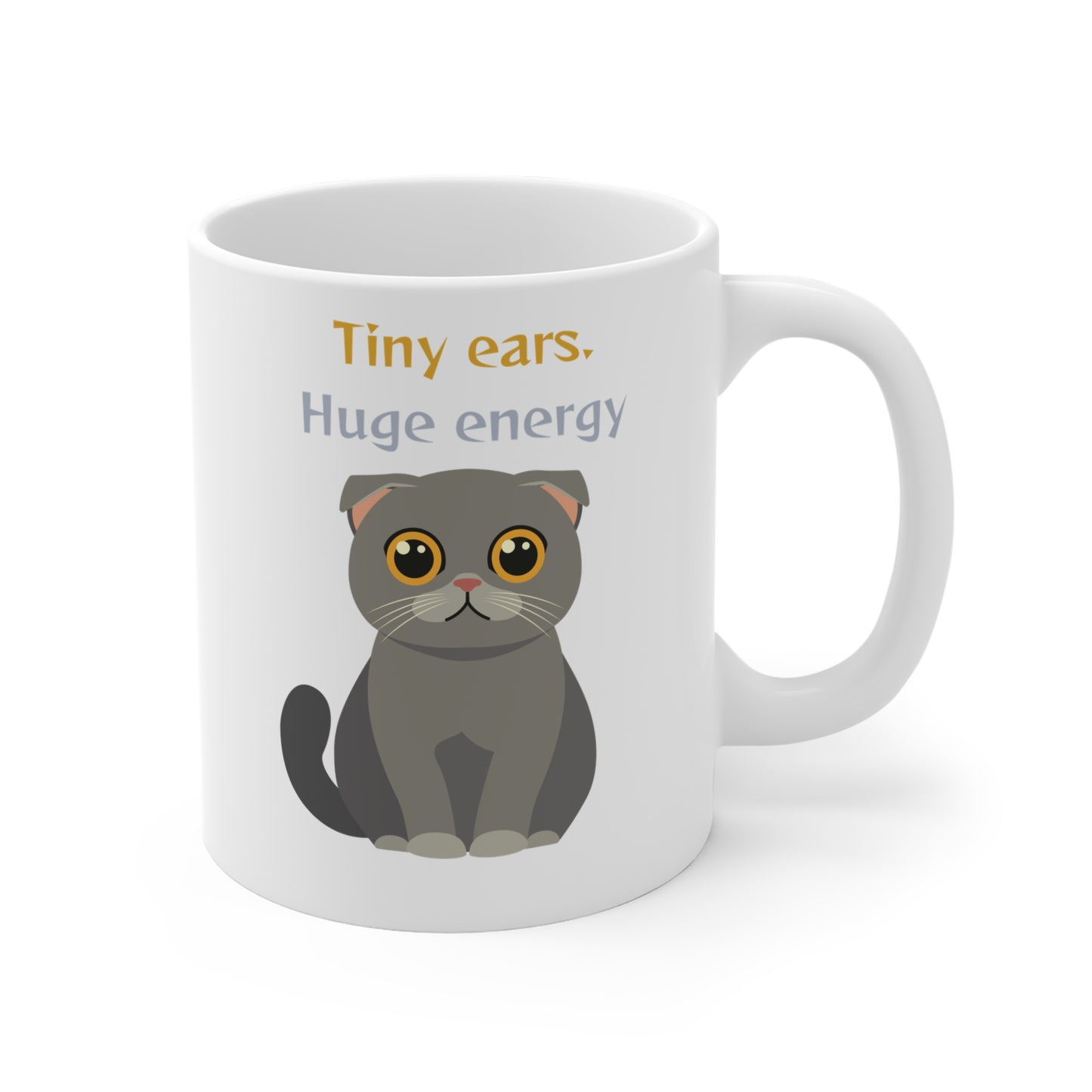 White coffee mug with Scottish Fold cat graphic and tiny ears huge energy slogan shown from left side