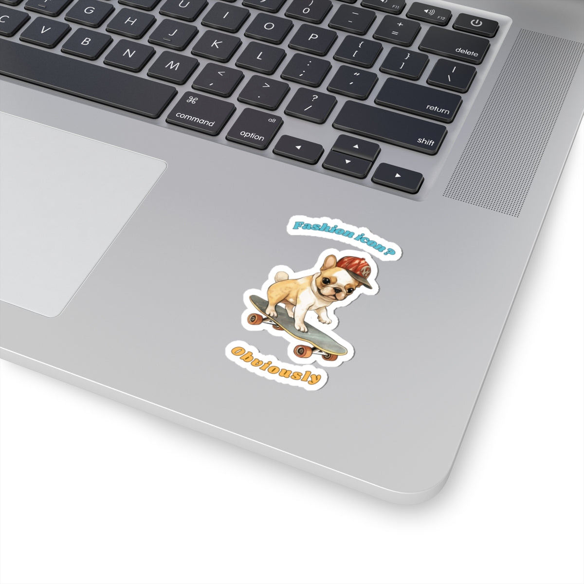 Kiss-cut sticker with French Bulldog graphic wearing a cap and fashion icon obviously slogan applied to laptop surface
