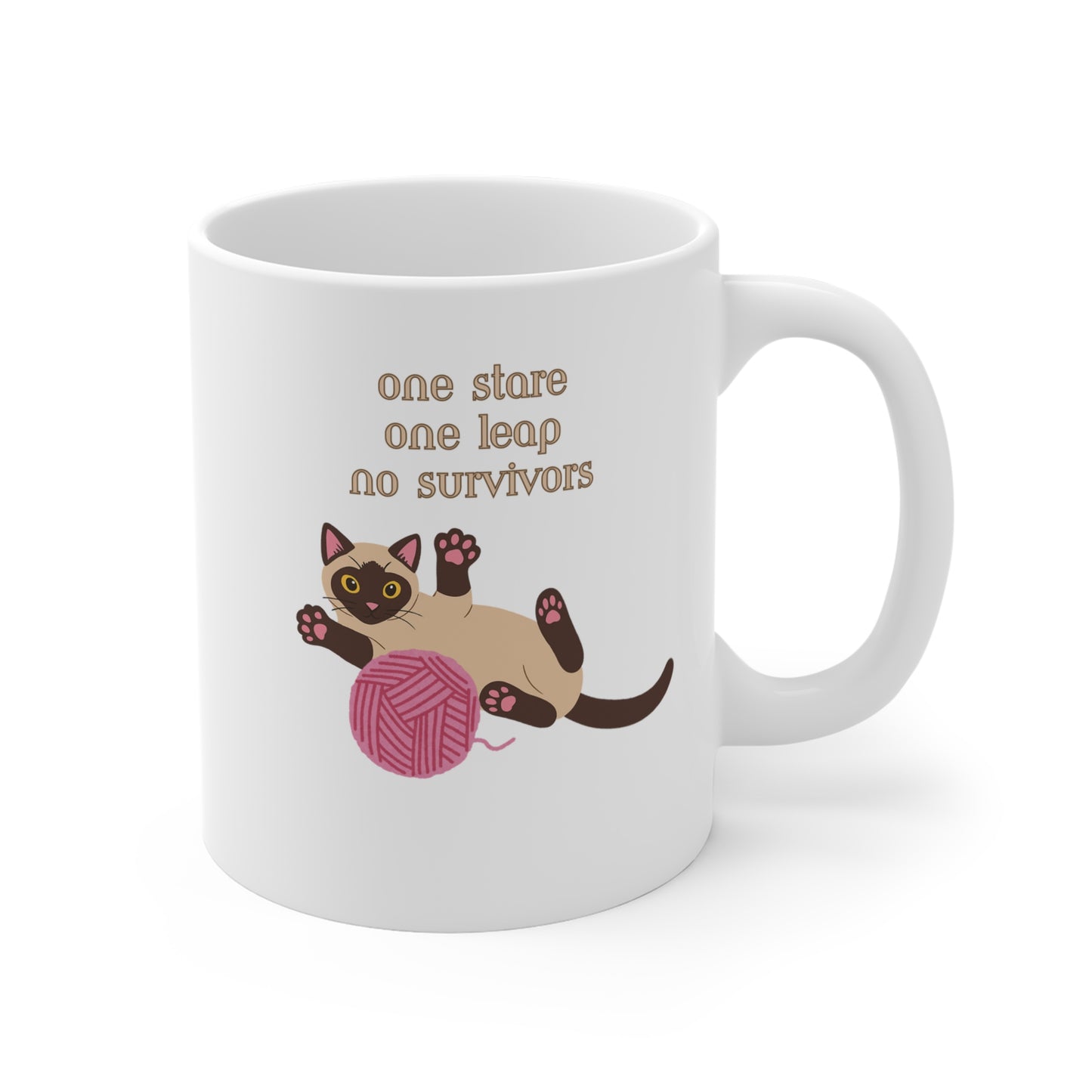 White coffee mug with Siamese cat graphic and one stare one leap no survivors slogan shown from right side
