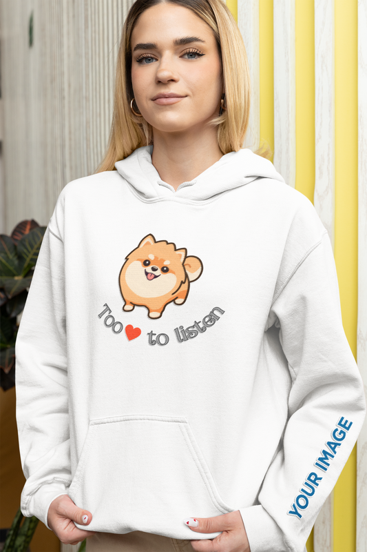 Woman wearing white Gildan hoodie with embroidered pomeranian graphic and too cute to listen slogan