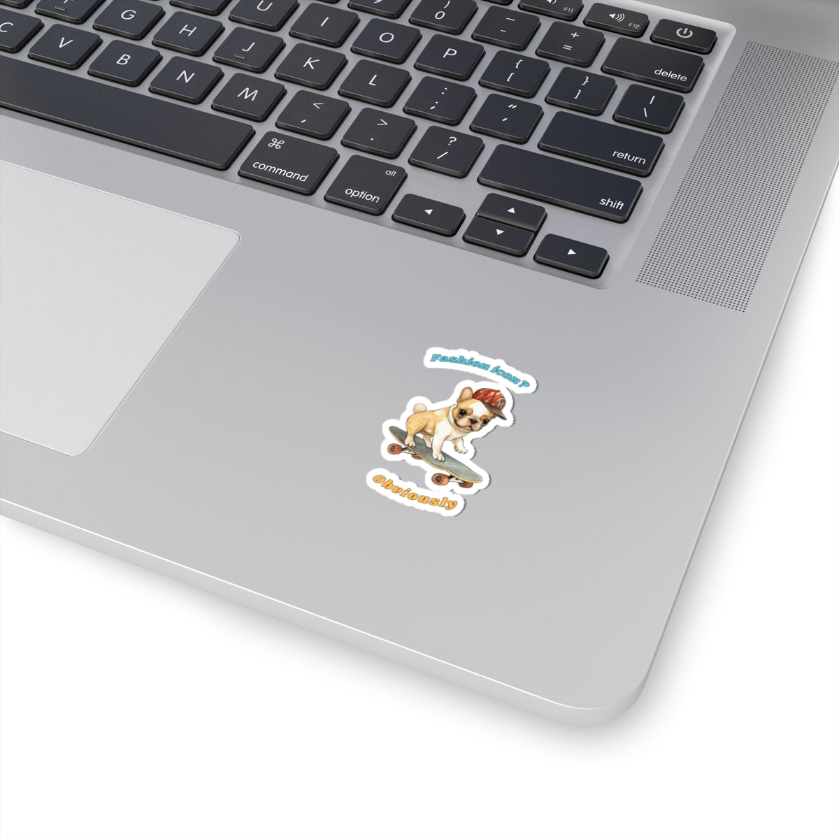Kiss-cut sticker with French Bulldog graphic wearing a cap and fashion icon obviously slogan applied to laptop surface